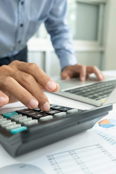 Businessman accountant counting money.